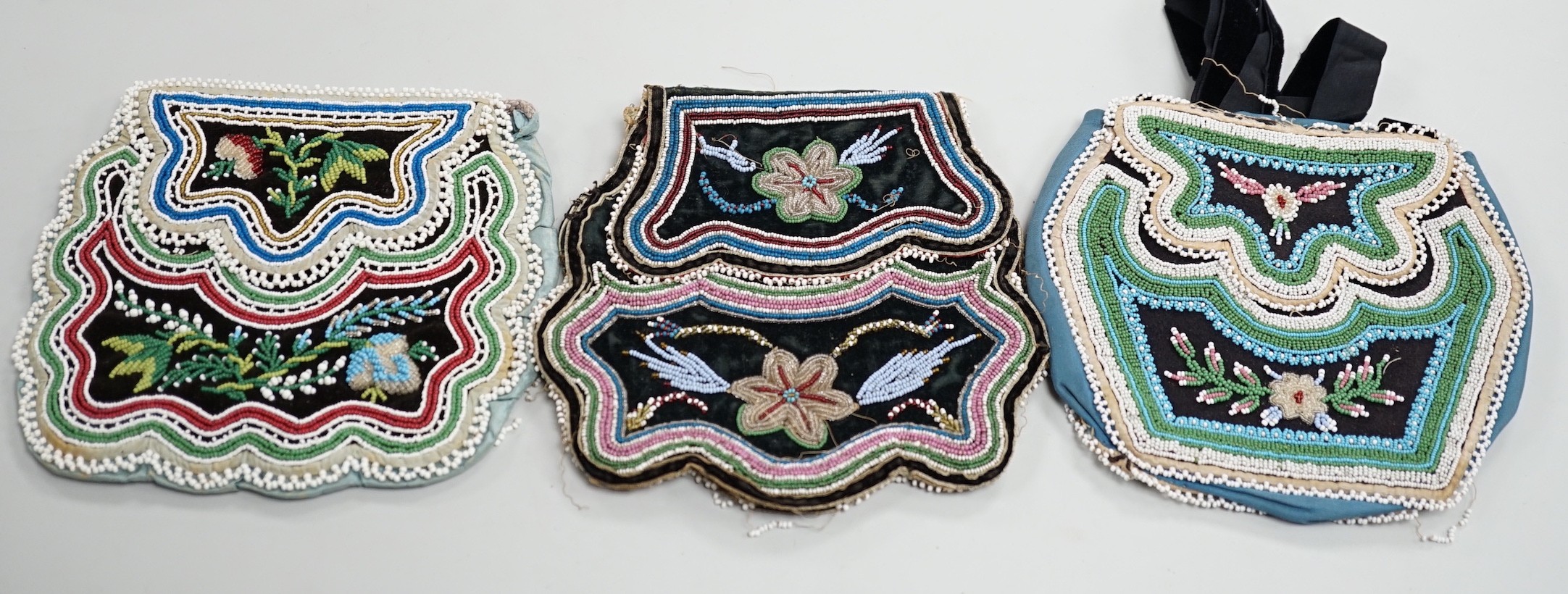 Three mid to late 19th century, Haudenosaunee (Iroquois) Grand River Reserve, native North American/Canadian fine glass beadwork and silk bags